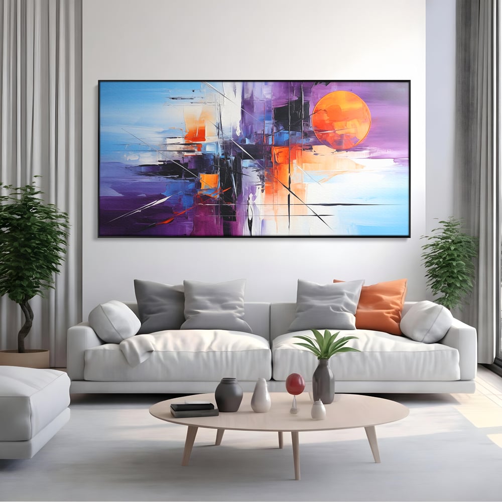 Tablou canvas cu pictura abstracta cu soare portocaliu, in rama de aluminiu negru, pe perete intr-un living